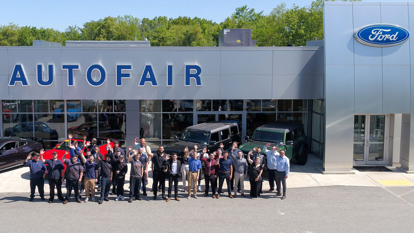 AutoFair Ford team in front of building